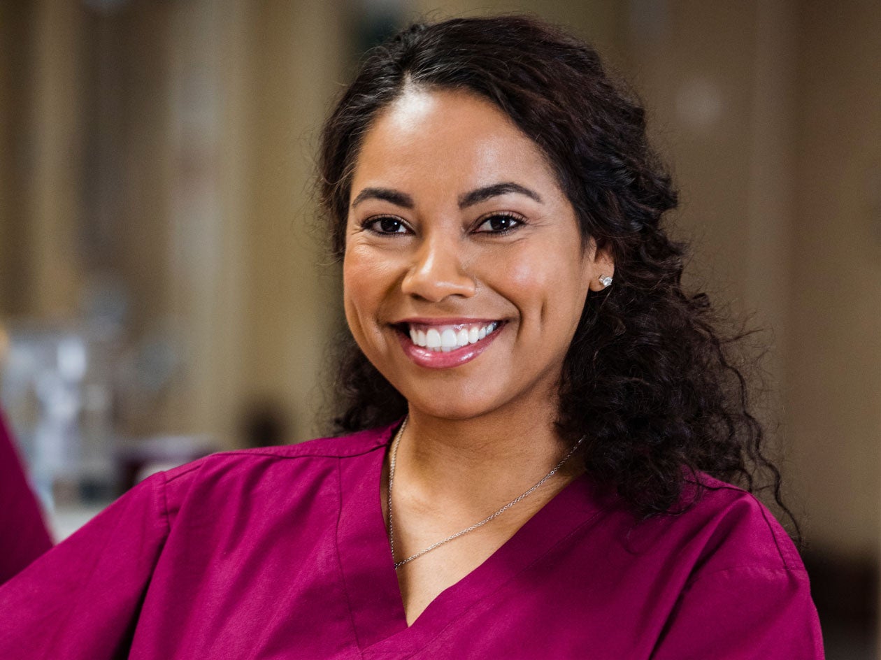 Headshot of smiling physician
