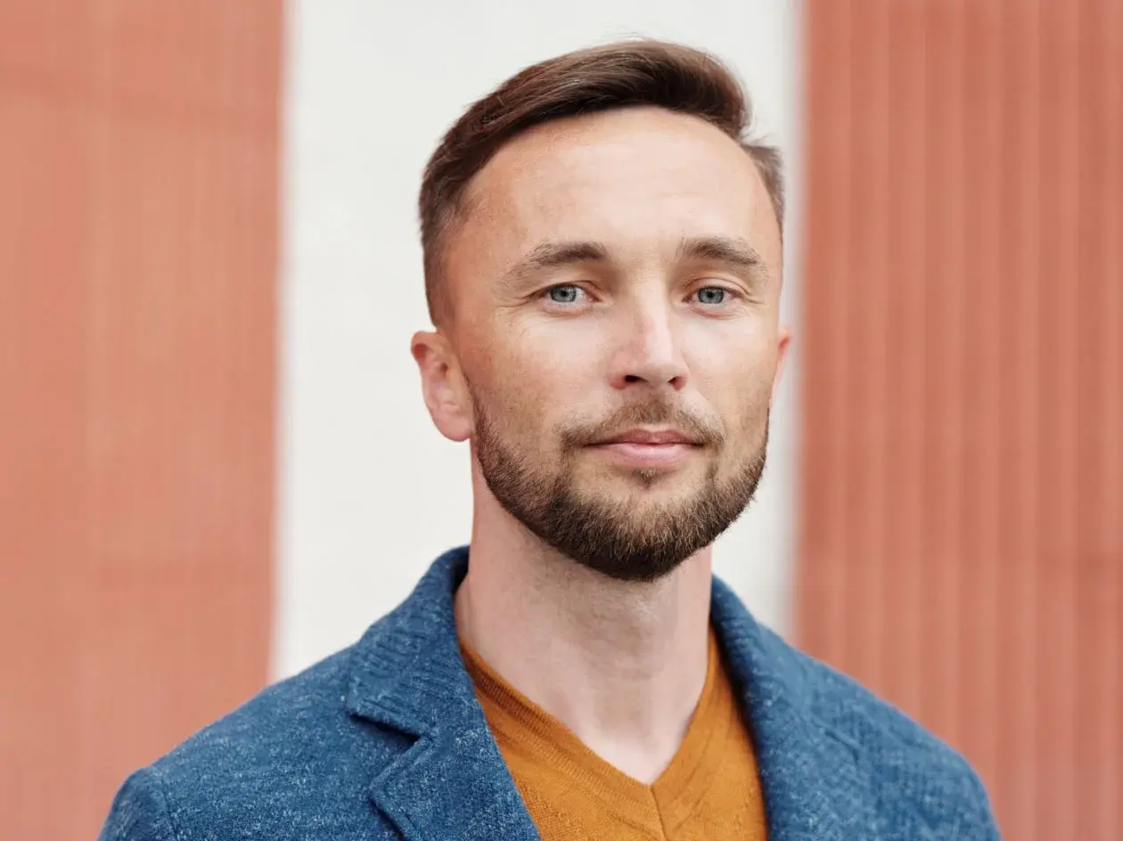 Headshot of a man with a beard.