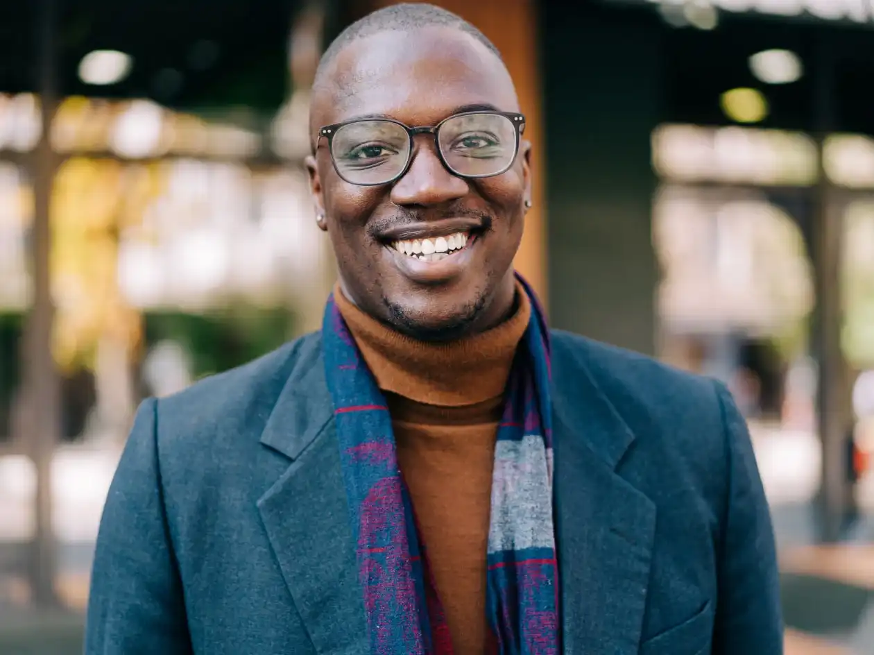 Smiling man wearing glasses