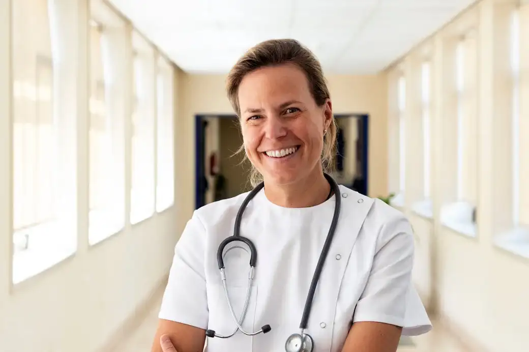 Smiling healthcare provider with stethoscope