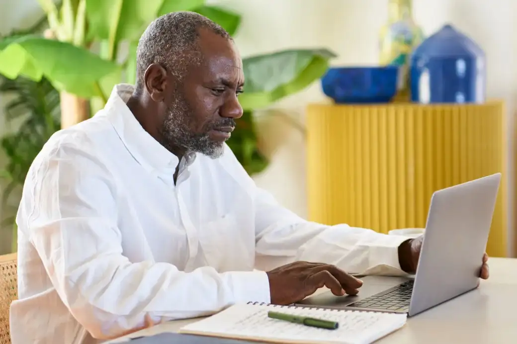 Man working on a laptop computer