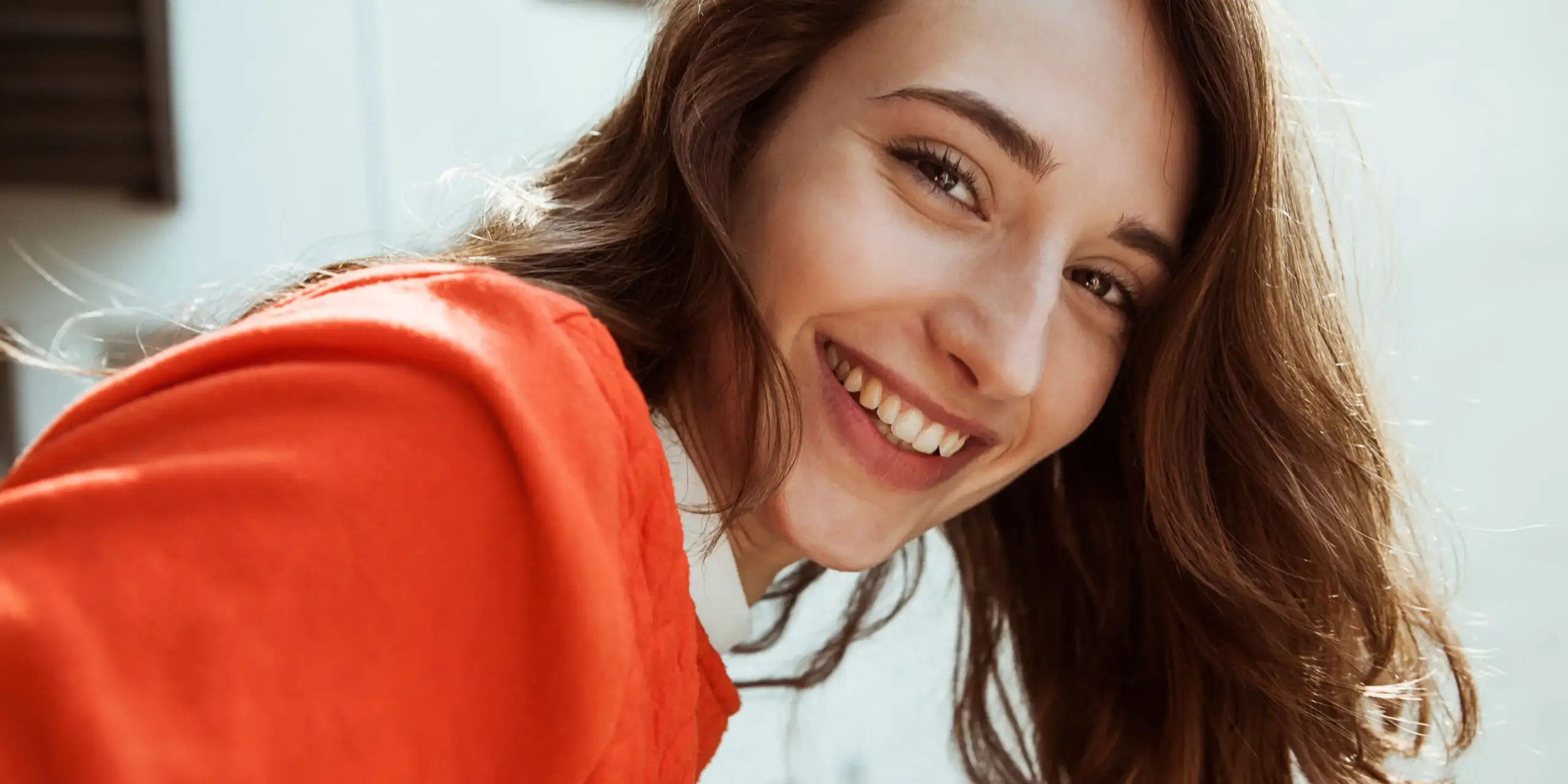 Smiling woman bringing the Human Experience to healthcare