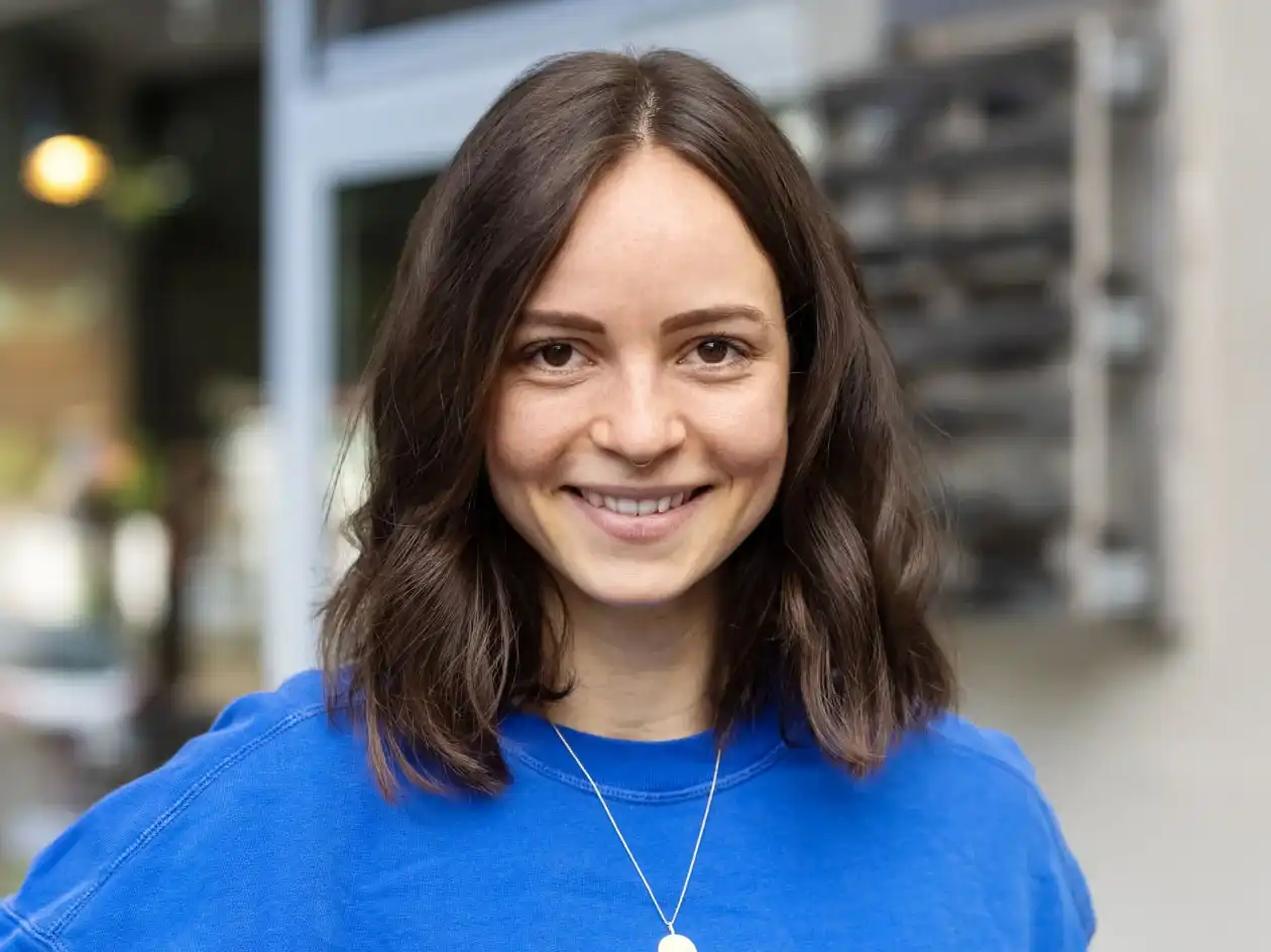 Closeup of a smiling healthcare patient.
