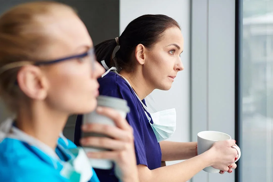 Two young female healthcare workers